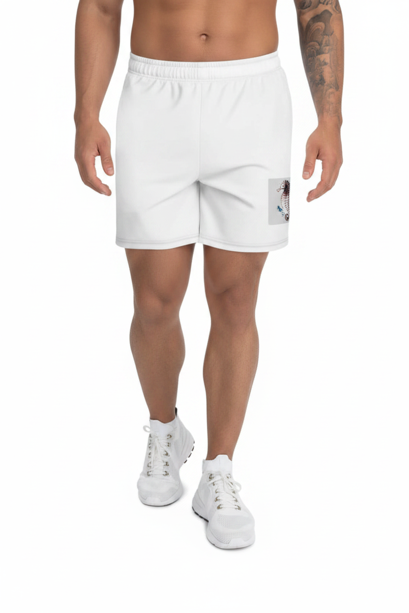 Male model wearing white athletic long shorts with seahorse graphic detail and white sneakers